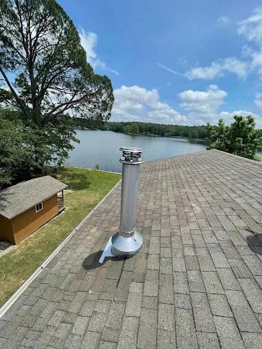 Stainless chimney system installed on a lakeside home