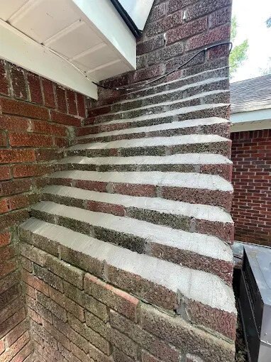 Close-up of fresh tuckpointing on brick